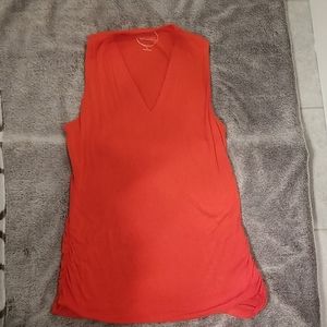 Burnt orange sleeveless shirt